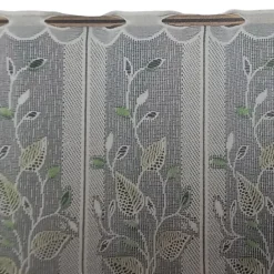 Brise-bise brodé à motifs feuillages