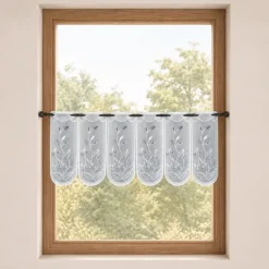 Brise-bise brodé à motifs feuillages