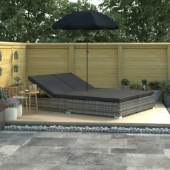 Chaise longue de jardin avec parasol