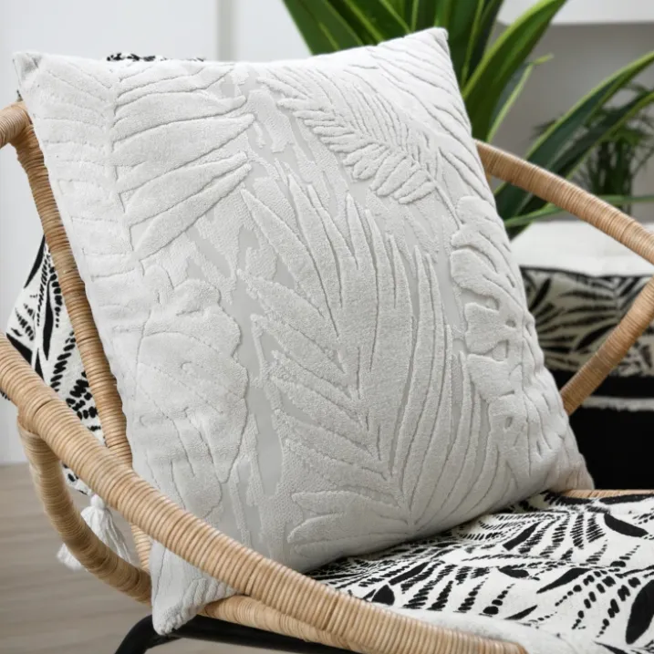Coussin carré effet velours avec motif en relief tropical