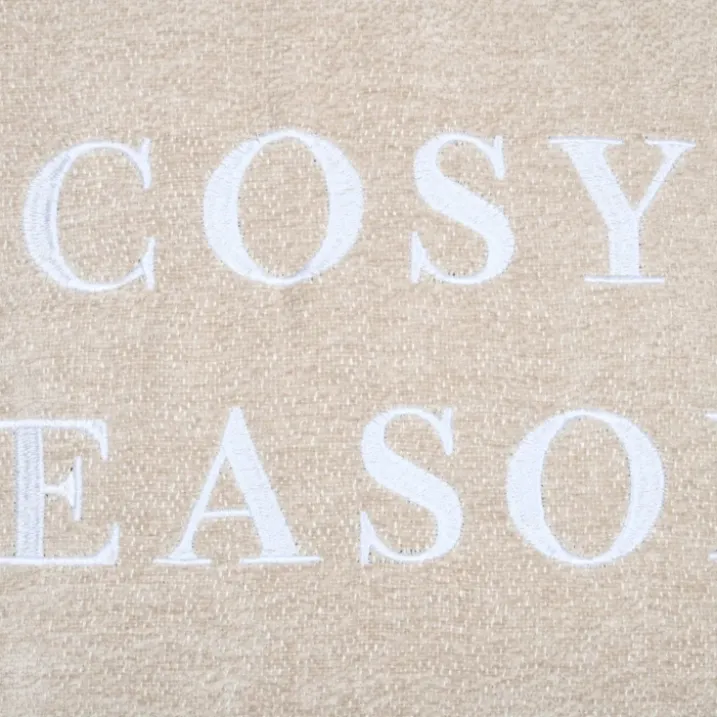 Coussin décoratif avec message brodé "Cosy Season"