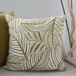 Coussin décoratif feuillage graphique en coton recyclé