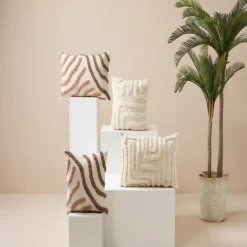 Coussin décoratif tufté en coton à motifs en relief