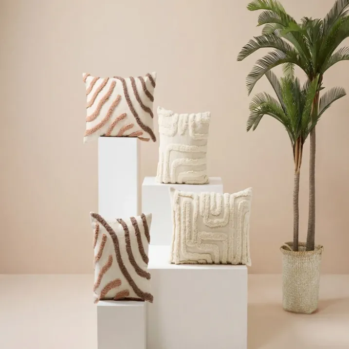 Coussin décoratif tufté en coton à motifs en relief