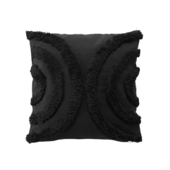 Coussin déhoussable aux motifs tuftés