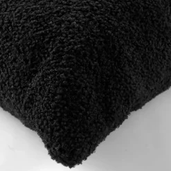 Coussin déhoussable en bouclette unie