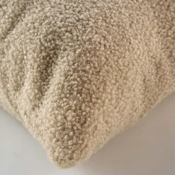 Coussin déhoussable en bouclette unie