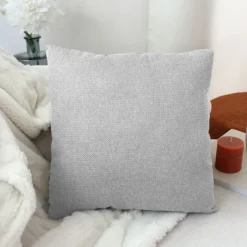 Coussin déhoussable en velours chenillé