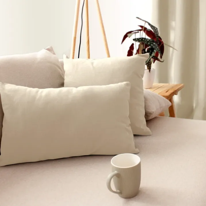 Coussin déhoussable uni en coton