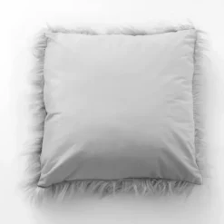 Coussin déhoussable uni imitation fourrure