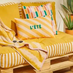Coussin extérieur rayé