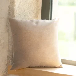 Coussin jacquard avec motif chalets