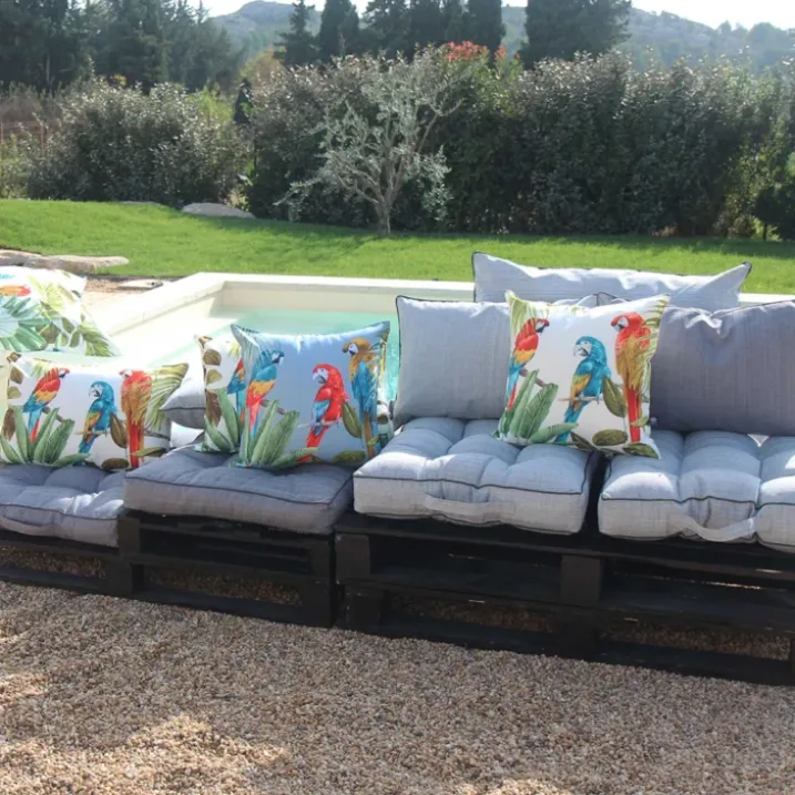 Coussin outdoor imprimé perroquets