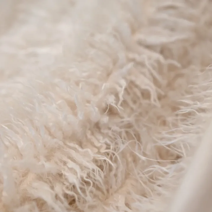 Coussin à poil long ultra doux