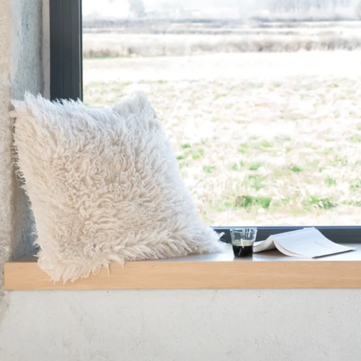 Coussin à poil long ultra doux