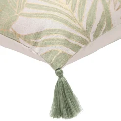 Coussin polycoton feuillages tropicaux métallisé à pompons