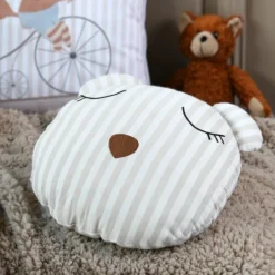 Coussin rayé en forme d'ours