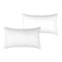 Coussin rectangulaire en coton déhoussable à pompons