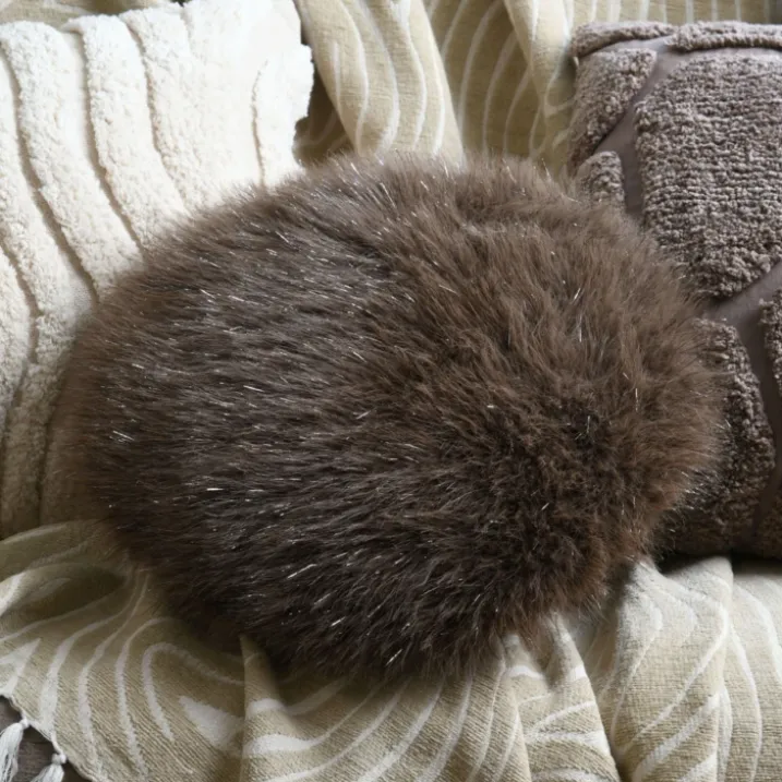 Coussin rond à poils longs