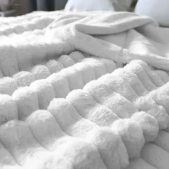 Couverture imitation fourrure et flanelle