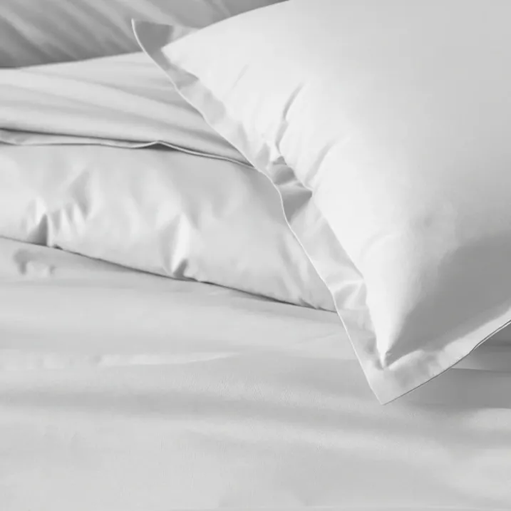 Drap plat piqué uni en percale de coton