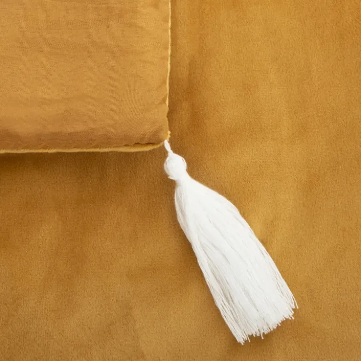 Édredon en velours et pompons