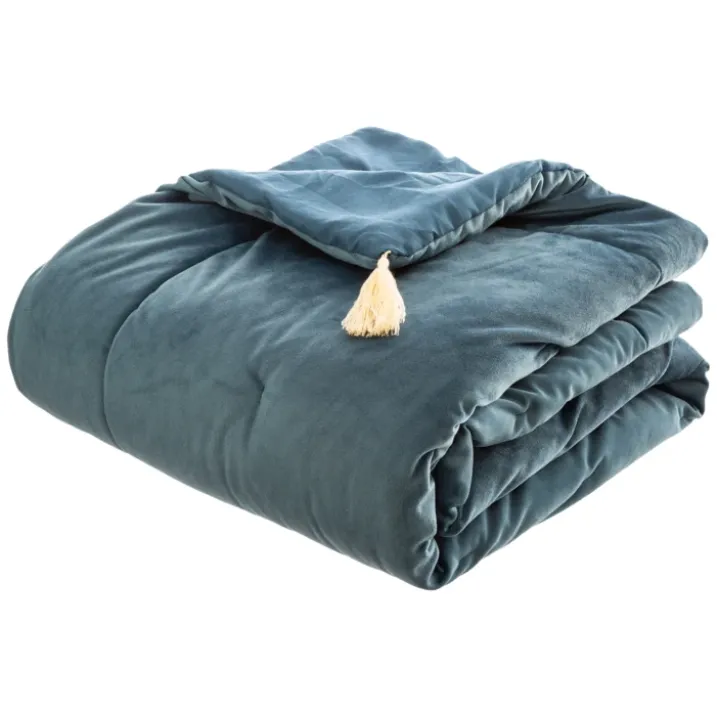 Édredon en velours et pompons
