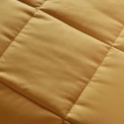 Edredon ou couvre-lit matelassé peau de pêche Oekotex