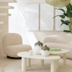 Fauteuil pivotant bois et mousse effet bouclette