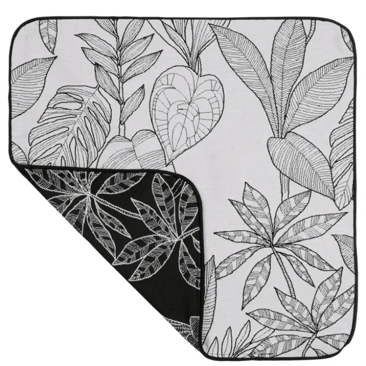 Housse de coussin aux feuilles stylisées