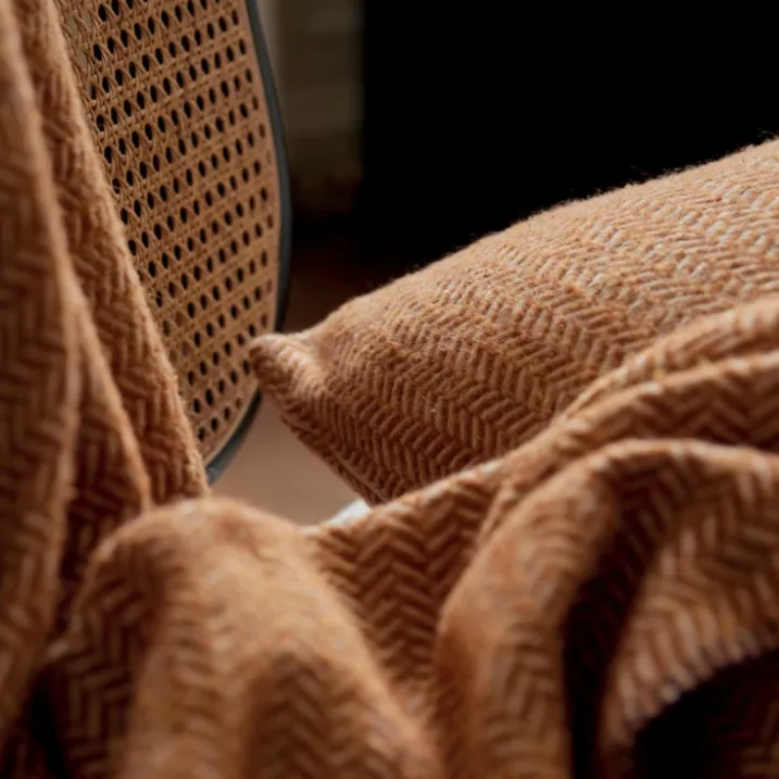 Housse de coussin en laine avec motif chevron