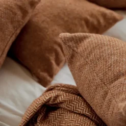 Housse de coussin en laine avec micro-motif losange