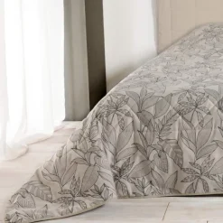 Jeté de lit aux feuilles stylisées