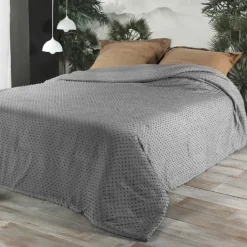 Jeté de lit à petits pompons