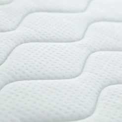 Matelas bébé face été / face hiver avec garnissage laine et soutien ferme
