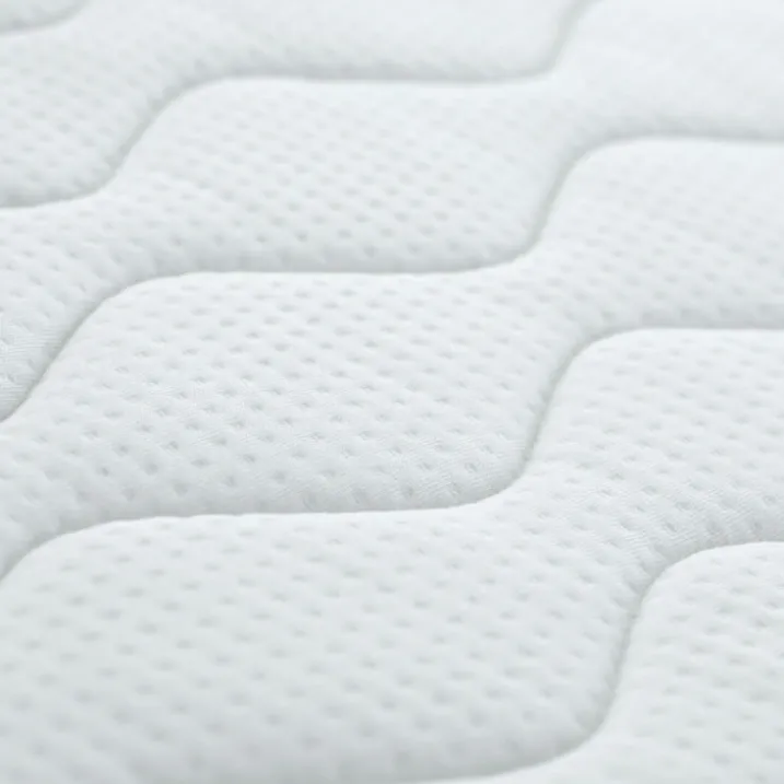 Matelas bébé face été / face hiver avec garnissage laine et soutien ferme