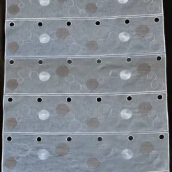 Modulable brodé de guirlandes circulaires