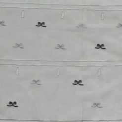 Modulable brodé à petits nœuds