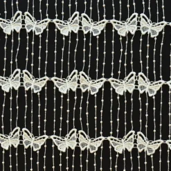 Modulable en macramé papillon