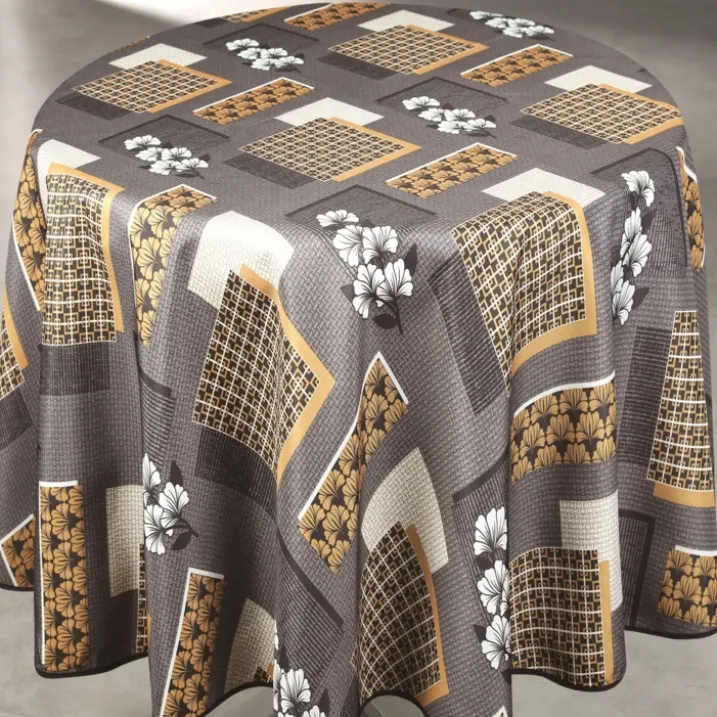 Nappe ronde anti taches motif fleur et forme géométrique