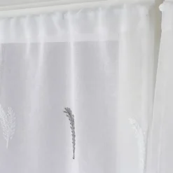 Paire de petits voilages aux broderies bicolores