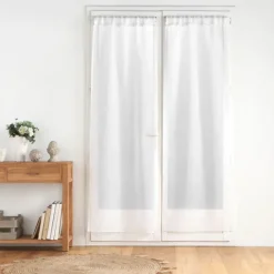 Paire de voilages passe-tringle en voile sablé avec finitions pompons