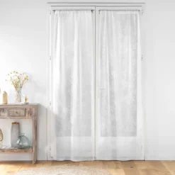 Paire de voilages passe-tringle en voile tissé motif feuillage