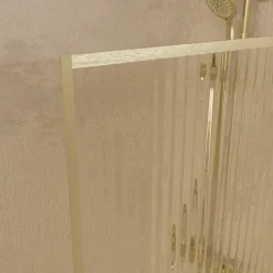 Paroi de douche en verre cannelé doré brossé