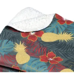 Plaid biface aux fleurs exotiques et colorées imitation fourrure