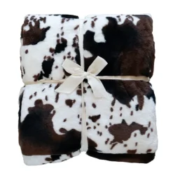 Plaid doux à motif peau de vache avec dos en velours