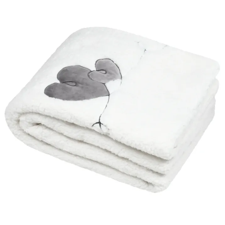 Plaid effet peau de mouton avec motif cœur
