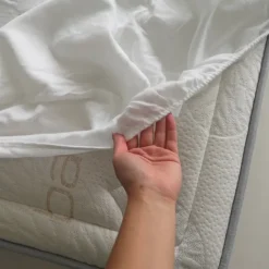 Protège-matelas en forme de drap housse