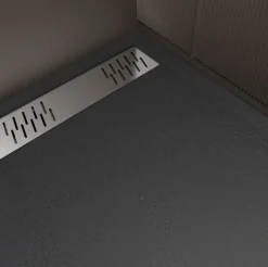 Receveur de douche extra-plat en résine effet pierregrille linéaire chrome