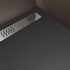 Receveur de douche extra-plat en résine effet pierregrille linéaire chrome